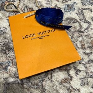 Louis Vuitton Orange gift Bag with Blue Ribbon
